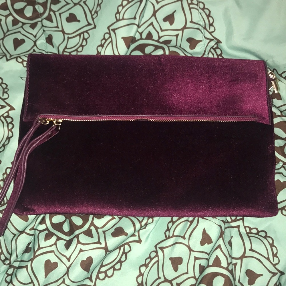 Plum cross body bag